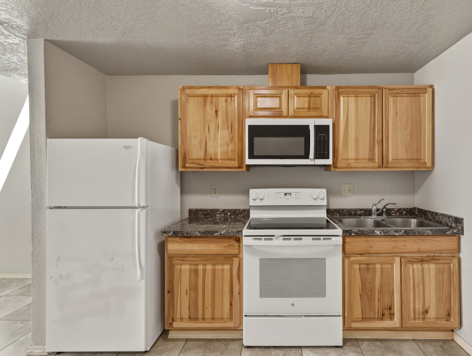 Interior kitchen with wood cabinets